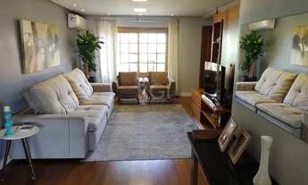 Imagem 4: Excelente casa com 03 suíte, espaço gourmet com churrasqueira, living com lareira, pátio c