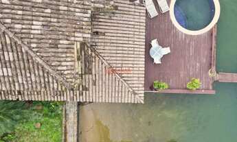 Imagem 4: Casa costeira com praia privativa, piscina, deck molhado, 7 quartos