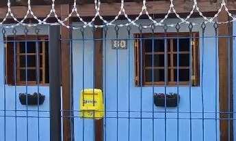 Imagem 2: Casa com 4 quartos com garagem e churrasqueira