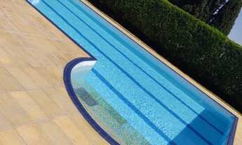 Imagem 3: Casa de condomínio para venda possui 410 metros quadrados com 4 quartos