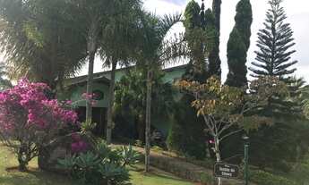 Imagem 2: Casa de condomínio alto padrão com 5 suítes piscina e paisagismo impecável