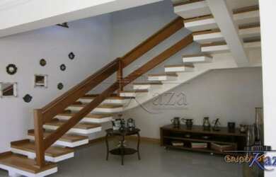 Imagem 6: Casa de condomínio para venda tem 538 metros quadrados com 5 quartos