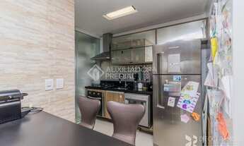 Imagem 7: Apartamento para venda tem 79 metros quadrados com 3 quartos em Passo da Areia - Porto Ale