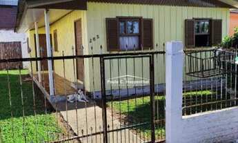 Imagem 3: Casa de madeira, conta com 02 dormitórios, sala, cozinha, banheiro social, área de serviço