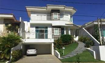 Imagem: Sobrado com vista para área verde e lago