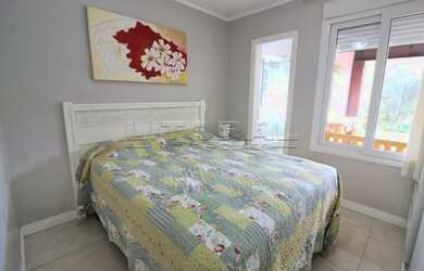 Imagem 4: Ótima casa com perfeita orientação solar, muito bem mobiliada e decorada