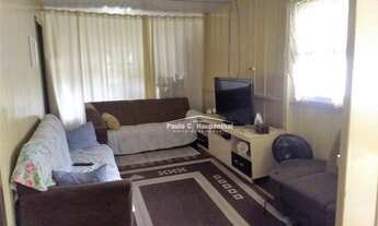 Imagem 6: Casa de madeira, conta com 02 dormitórios, sala, cozinha, banheiro social, área de serviço