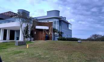 Imagem 3: Casa de condomínio para venda tem 450 metros quadrados com 4 quartos