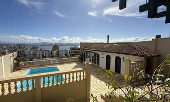 Imagem: Casa com 3 quartos, sendo 1suíte, com piscina