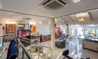 Imagem 3: Casa de condomínio para venda possui 382 metros quadrados com 4 quartos