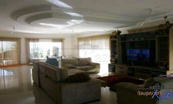 Imagem 2: Casa de condomínio para venda tem 538 metros quadrados com 5 quartos