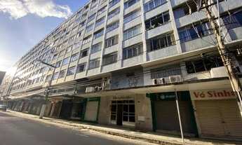 Imagem: Centro, quarto e sala com elevadores e portaria