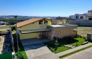 Imagem 4: Casa de condomínio térrea para venda tem 280 metros quadrados com 4 quartos