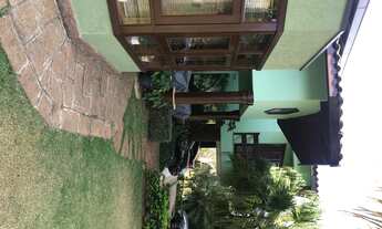 Imagem 4: Casa de condomínio alto padrão com 5 suítes piscina e paisagismo impecável