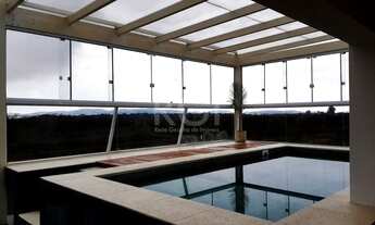 Imagem 5: Casa de condomínio para venda tem 450 metros quadrados com 4 quartos