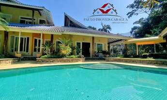 Imagem 1: Sobrado em condomínio para venda possui 544 m² com 4 suítes e piscina - Massaguaçu - Carag