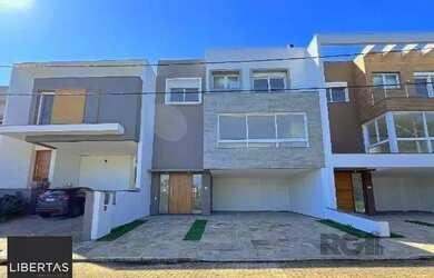 Imagem 2: Casa Condominio em Porto Alegre, no bairro Hípica, com 3 dormitório(s), e 3 banh