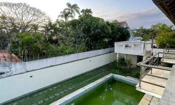 Imagem 3: Casa de condomínio para venda possui 1035 metros quadrados com 5 quartos