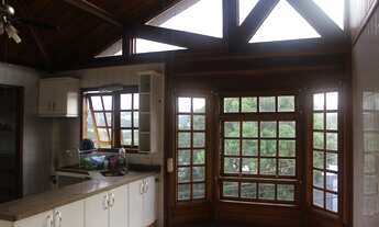 Imagem 2: Casa de condomínio térrea para venda possui 450 metros quadrados com 4 quartos