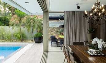 Imagem 4: Casa para aluguel e venda possui 500 metros quadrados com 5 quartos..