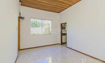 Imagem 3: CASA COM AMPLO PÁTIO, 3 DORMITÓRIOS SENDO 1 SUÍTE COM HIDRO E GARAGEM PARA 4 CARROS NO BAI