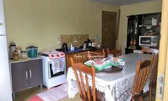 Imagem 4: Casa de madeira, conta com 02 dormitórios, sala, cozinha, banheiro social, área de serviço