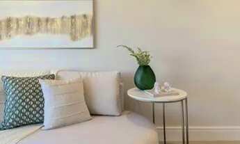 Imagem 6: Studio decorado com sacada e vista mar