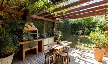 Imagem 3: EXCELENTE CASA COM 5 SUÍTES E 4 VAGAS DE GARAGEM