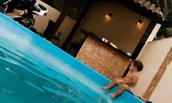 Imagem 3: Casa com 3 pisos e piscina