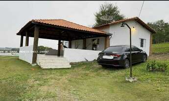 Imagem 2: Sítio de 21.500 m2, com casa sede, casa de caseiro e piscina em Porangaba