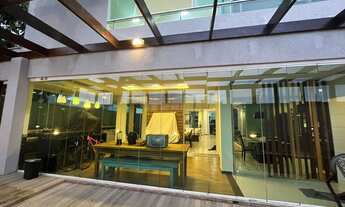 Imagem: Casa com 4 suítes, piscina com área de