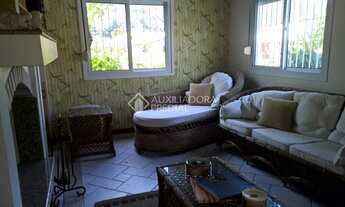 Imagem 3: Casa de condomínio para venda tem 220 metros quadrados com 3 quartos