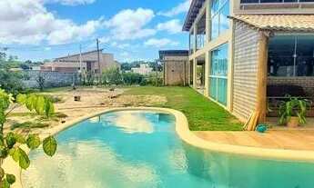 Imagem: Casa de primeiro andar com 5 suítes num