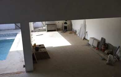 Imagem 3: Casa planejada sob encomenda entrega programada, Área gourmet com ilha de granito e armári