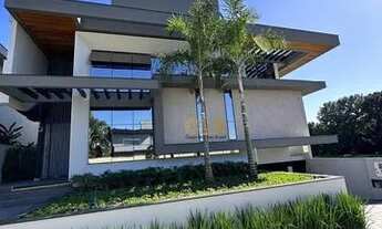 Imagem 2: Casa alto padrão em construção em Condomínio Fechado no bairro Jurerê Internacional - Flor