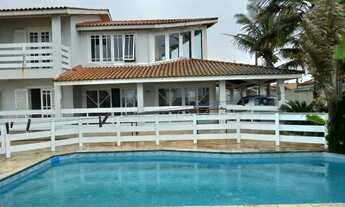 Imagem 1: Casa com piscina em frente a praia em Itanhaém