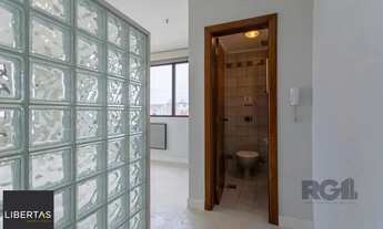 Imagem 7: Sala comercial e uma vaga de garagem no bairro Menino Deus em Porto Alegre