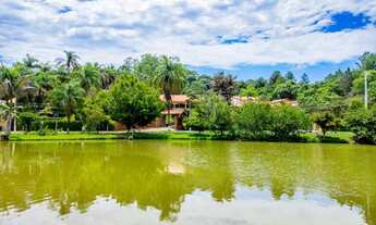 Imagem 1: Casa em condomínio fechado a 77 km de Sao Paulo. 4 suítes 4 vagas fixas cobertas, lago..