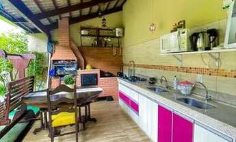 Imagem 3: Casa em condomínio com lago de carpas