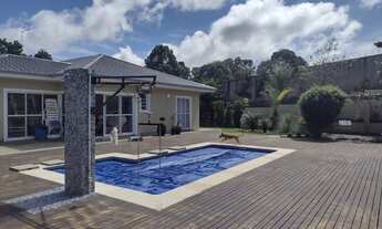 Imagem 2: Casa de condomínio térrea para venda possui 450 metros quadrados com 5 quartos