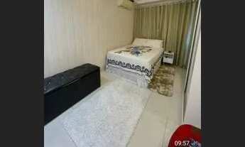 Imagem 7: Casa em condomínio com lago de carpas