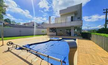 Imagem 3: Figueira Garden: Casa 418m² Porteira Fechada, 4 Suítes, Automação e Piscina Aquecida!