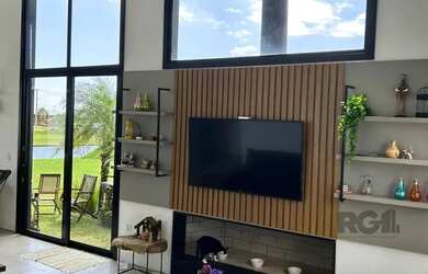 Imagem 4: Casa em condomínio com 3 suítes, churrasqueira, lareira, vagas de garagem - 175m² no bairr