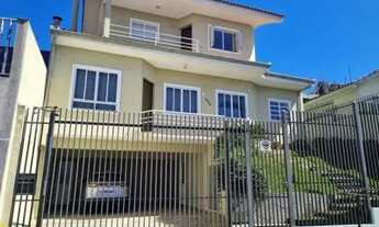 Imagem 5: Casa ampla no Novo Mundo. 05 quartos. 01 suíte. 04 vagas. 235 m² averbados