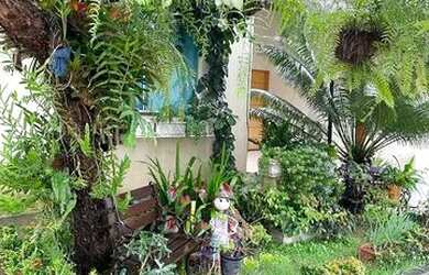 Imagem 5: Casa em condomínio com lago de carpas