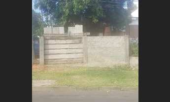 Imagem: Terreno com uma casa