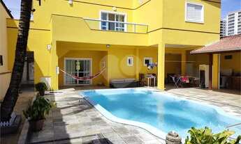 Imagem 3: Sobrado para venda possui 286 metros quadrados com 6 quartos em Canto do Forte - Praia Gra