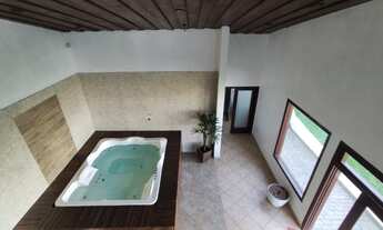 Imagem 2: Casa na praia com piscina aquecida, sauna, hidromassagem, salão de jogos, ar condicionado