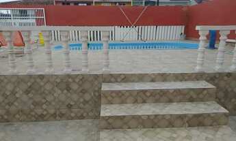 Imagem 2: Tranquilidade e sossego na praia com piscina