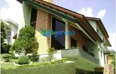 Imagem 3: Casa de condomínio para venda tem 500 metros quadrados com 5 quartos